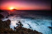 6 April 2020; The sun rises behind the Ballycotton Lighthouse in Ballycotton, Cork. Photo by Eóin Noonan/Sportsfile