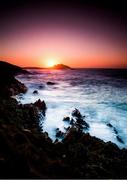 6 April 2020; The sun rises behind the Ballycotton Lighthouse in Ballycotton, Cork. Photo by Eóin Noonan/Sportsfile