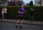 10 April 2020; Former Dundalk, Drogheda United, Bray Wanderers and current St Mochta's player Mick Daly, during his 8pm run, aims to raise much-needed funds for Cystic Fibrosis Ireland. So as to reflect 65 Roses, Mick Daly along with others are taking part in a challenge - 6k run every 5 hours over the day. The 6k route in Riverwood / Carpenterstown area was first run on Friday at 12am then 5am, 10am, 3pm and final one at 8pm. Photo by Stephen McCarthy/Sportsfile