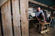 5 May 2020; Masters athlete Pat Naughton, age 87, cuts up wood following a training session at his home in Nenagh, Tipperary, during the on-going Coronavirus (COVID-19) pandemic. Photo by Stephen McCarthy/Sportsfile