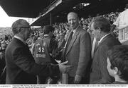 3 September 1989; The former Republic of Ireland manager Jack Charlton, 3rd from left, and his assistant Maurice Setters, right, are shown to their seats. All-Ireland Hurling Final, Tipperary v Antrim, Croke Park. Photo by Ray McManus/Sportsfile