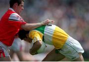 7 May 2000; Vinny Claffey of Offaly in action against Nicky Malone of Louth during the Church & General National Football League Division 2 Final between Louth and Offaly at Croke Park in Dublin. Photo by Brendan Moran/Sportsfile