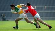 7 May 2000; Vinny Claffey of Offaly in action against Brendan Reilly of Louth during the Church & General National Football League Division 2 Final between Louth and Offaly at Croke Park in Dublin. Photo by Brendan Moran/Sportsfile