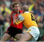 28 May 2000; Mickey Linden, Down, in action against Anto Finnegan, Antrim. Down v Antrim, Ulster Senior Football Championship, Casement Park, Belfast. Photo by David Maher/Sportsfile