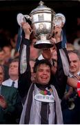 7 May 1995; Derry City captain Dermot O'Neill lifts the cup following the Bord Gáis League Cup Final between Derry City and Shelbourne at Lansdowne Road in Dublin. Photo by David Maher/Sportsfile