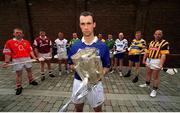 8 May 2002; Tipperary captain Thomas Dunne with the Liam MacCarthy cup, along with 9 other county captains, from left, Wayne Sherlock of Cork, Liam Hodgins of Galway, John Lyons of Laois, Joe Errity of Offaly, Larry O'Gorman of Wexford, Mark Foley of Limerick, Fergal Hartley of Waterford, Brian Lohan of Clare and Andy Comerford of Kilkenny at the launch of the Guinness All-Ireland Hurling Championship at the Guinness Storehorse in Dublin. Photo by Brendan Moran/Sportsfile