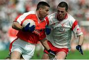 19 May 2002; Diarmuid Marsden, Armagh in action against Conor Gormley, Tyrone, Tyrone v Armagh, Ulster Senior Football Championship, St. Tierneach's Park, Clones, Monaghan. Photo by Pat Murphy/Sportsfile