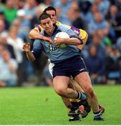 1 June 2002; Jonathan Magee, Dublin in action against Redmond Magee, Wexford, Dublin v Wexford, Bank of Ireland, Leinster Football Championship, Dr. Cullen Park, Carlow. Football. Photo by Damien Eagers/Sportsfile