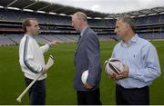 19 September 2003; DJ Carey explains the bounce of the sliothar to Jack Charlton and Tony Ward when the three legends of Irish sport came together, in Croke Park, Dublin, for a Flora pro.active cholesterol awareness campaign to mark World Heart Day, which is Sunday 28 September 2003. Picture credit; Ray McManus / SPORTSFILE *EDI*