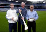 19 September 2003; Jack Charlton demonstrates his method of holding a hurley when the three legends of Irish sport, DJ Carey, Tony Ward and Jack Charlton came together in Croke Park, Dublin, for a Flora pro.active cholesterol awareness campaign to mark World Heart Day, which is Sunday 28 September 2003. Picture credit; Ray McManus / SPORTSFILE