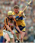 7 May 1995; Liam Keoghan of Kilkenny in action against Conor Clancy of Clare during the Church & General National League Hurling Final between Kilkenny and Clare at Semple Stadium in Thurles, Tipperary. Photo by Ray McManus/Sportsfile