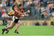 7 May 1995; Adrian Ronan of Kilkenny in action against PJ O'Connell of Clare during the Church & General National League Hurling Final between Kilkenny and Clare at Semple Stadium in Thurles, Tipperary. Photo by Ray McManus/Sportsfile