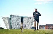7 May 2020; Irish Olympic Marathon Runner Stephen Scullion during a training session with his dog Nala the Weimaraner at the Titanic Quarter in Belfast, Northern Ireland. Photo by David Fitzgerald/Sportsfile