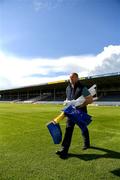 9 May 2020; Thurles groundsman Dave Hanley with pitchside flags on the evening of the Munster GAA Football Senior Championship quarter-final match between Tipperary and Clare at Semple Stadium in Thurles, Tipperary. This weekend, May 9 and 10, was due to be the first weekend of games in Ireland of the GAA All-Ireland Senior Championship, beginning with provincial matches, which have been postponed following directives from the Irish Government and the Department of Health in an effort to contain the spread of the Coronavirus (COVID-19). The GAA have stated that no inter-county games will take place before October 2020. Photo by Ray McManus/Sportsfile