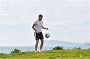 11 May 2020; Cabinteely FC footballer Kevin Knight during a training session at Killiney Strand in Dublin while adhering to the guidelines of social distancing set down by the Health Service Executive. Following directives from the Irish Government and the Department of Health the majority of the country's sporting associations have suspended all organised sporting activity in an effort to contain the spread of the Coronavirus (COVID-19). Photo by Seb Daly/Sportsfile