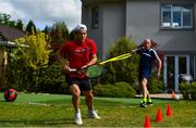 11 May 2020; Irish No.1 ranked tennis player and Davis Cup team member Simon Carr with his physical trainer and father Tommy Carr during a training session at his home in Westmeath while adhering to the guidelines of social distancing set down by the Health Service Executive. Following directives from the Irish Government and the Department of Health the majority of the country's sporting associations have suspended all organised sporting activity in an effort to contain the spread of the Coronavirus (COVID-19). Photo by Seb Daly/Sportsfile