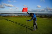 11 May 2020; Golf Course Superintendent of Howth Golf Club Ger Morgan works on the 9th green at Howth Golf Club in Dublin as it prepares to re-open as one of the first sports allowed to resume having followed previous directives from the Irish Government on suspending all golfing activity in an effort to contain the spread of the Coronavirus (COVID-19). Golf clubs in the Republic of Ireland can resume activity from May 18th under the Irish government’s Roadmap for Reopening of Society and Business once they follow the protocol jointly published by the GUI and ILGU. The protocol sets out safe measures for golf to return in a phased manner. Photo by Brendan Moran/Sportsfile