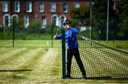 15 May 2020; Matthew Mc Glade, age 6, from Grosvenor Square, prepares the netting on the tennis lawns, under the supervision of his father Marc, a committee memeber, at Stratford Lawn Tennis Club in Rathmines, Dublin, as it prepares to re-open as one of the first sports allowed to resume having followed previous directives from the Irish Government on suspending all tennis activity in an effort to contain the spread of the Coronavirus (COVID-19). Tennis clubs in the Republic of Ireland can resume activity from May 18th under the Irish government’s Roadmap for Reopening of Society and Business once they follow the protocol published by the Tennis Ireland. The protocol sets out safe measures for tennis to return in a phased manner. Photo by Stephen McCarthy/Sportsfile