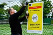 15 May 2020; Paul Foley of Digital Print and Image prepares social distancing signage at Malahide Lawn Tennis and Croquet Club in Dublin as it prepares to re-open as one of the first sports allowed to resume having followed previous directives from the Irish Government on suspending all tennis activity in an effort to contain the spread of the Coronavirus (COVID-19). Tennis clubs in the Republic of Ireland can resume activity from May 18th under the Irish government’s Roadmap for Reopening of Society and Business once they follow the protocol published by Tennis Ireland. The protocol sets out safe measures for tennis to return in a phased manner. Photo by Brendan Moran/Sportsfile