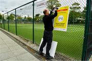 15 May 2020; Paul Foley of Digital Print and Image prepares social distancing signage at Malahide Lawn Tennis and Croquet Club in Dublin as it prepares to re-open as one of the first sports allowed to resume having followed previous directives from the Irish Government on suspending all tennis activity in an effort to contain the spread of the Coronavirus (COVID-19). Tennis clubs in the Republic of Ireland can resume activity from May 18th under the Irish government’s Roadmap for Reopening of Society and Business once they follow the protocol published by Tennis Ireland. The protocol sets out safe measures for tennis to return in a phased manner. Photo by Brendan Moran/Sportsfile