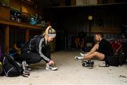 18 May 2020; Club members Aoife Lynch, Alex Clarkin and Jack Raftery put on their spikes prior to a training session at Donore Harriers Athletic Club in Dublin as athletics resumes having previously suspended all activity following directives from the Irish Government in an effort to contain the spread of the Coronavirus (COVID-19). Athletics clubs in the Republic of Ireland resumed activity on May 18th under the Irish government’s Roadmap for Reopening of Society and Business following strict protocols of social distancing and hand sanitisation among others allowing it to return in a phased manner. Photo by Harry Murphy/Sportsfile
