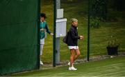 18 May 2020; Club members Kristen Barton, left, and Tracey Watters sanitise their hands prior to a game of tennis at Malahide Lawn Tennis and Croquet Club in Dublin as tennis resumes having previously suspended all tennis activity following directives from the Irish Government in an effort to contain the spread of the Coronavirus (COVID-19). Tennis clubs in the Republic of Ireland resumed activity on May 18th under the Irish government’s Roadmap for Reopening of Society and Business following strict protocols of social distancing, hand sanitisation and marked tennis balls among others allowing tennis to return in a phased manner. Photo by Brendan Moran/Sportsfile