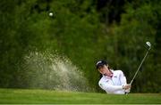 18 May 2020; Club member and Irish professional golfer Leona Maguire plays out of the bunker on the 4th hole during a round of golf at Slieve Russell Golf Club in Cavan as it resumes having previously suspended all activity following directives from the Irish Government in an effort to contain the spread of the Coronavirus (COVID-19). Golf clubs in the Republic of Ireland resumed activity on May 18th under the Irish government’s Roadmap for Reopening of Society and Business following strict protocols of social distancing and hand sanitisation among others allowing it to return in a phased manner. Photo by Ramsey Cardy/Sportsfile