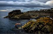 19 May 2020; Jessica McGurk from Dublin dives into the sea at the Forty Foot at Sandycove in Dublin which re-opened to the public having previously been closed off following directives from the Irish Government in an effort to contain the spread of the Coronavirus (COVID-19) pandemic. Photo by David Fitzgerald/Sportsfile