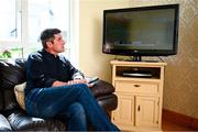 20 May 2020; Derry City manager Declan Devine watches a recording of his team on television at home in Bridgend, Donegal. Photo by Stephen McCarthy/Sportsfile