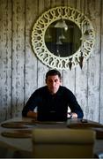 20 May 2020; Derry City manager Declan Devine works on his laptop in his kitchen at his home in Bridgend, Donegal. Photo by Stephen McCarthy/Sportsfile