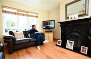 20 May 2020; Derry City manager Declan Devine watches a recording of an SSE Airtricity League match on television at home in Bridgend, Donegal. Photo by Stephen McCarthy/Sportsfile