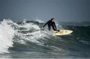 26 May 2020; A surfer rides a wave at Lahinch in Clare. Photo by Seb Daly/Sportsfile