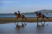 3 June 2020; Leanne Breen on La Novia, left, and Aili Leah on Lottieloveheart during a morning ride on Greencastle Beach in Greencastle, Co. Down. Horse racing is due to return behind closed doors on June 8, after racing was suspended in an effort to contain the spread of the Coronavirus (COVID-19) pandemic. Photo by Ramsey Cardy/Sportsfile