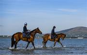 3 June 2020; Leanne Breen on La Novia, right, and Aili Leah on Lottieloveheart during a morning ride on Greencastle Beach in Greencastle, Co. Down. Horse racing is due to return behind closed doors on June 8, after racing was suspended in an effort to contain the spread of the Coronavirus (COVID-19) pandemic. Photo by Ramsey Cardy/Sportsfile