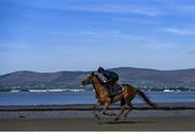3 June 2020; Leanne Breen on La Novia during a morning ride on Greencastle Beach in Greencastle, Co. Down. Horse racing is due to return behind closed doors on June 8, after racing was suspended in an effort to contain the spread of the Coronavirus (COVID-19) pandemic. Photo by Ramsey Cardy/Sportsfile
