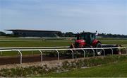 4 June 2020; A groundsman tends to the gallops at The Curragh in Kildare. Horse racing is due to return to Ireland behind closed doors on June 8, after racing was suspended in an effort to contain the spread of the Coronavirus (COVID-19) pandemic. Photo by Harry Murphy/Sportsfile