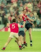 18 June 1995; Seamus O'Hanlon of Louth in action against Vinny Murphy, left, and Paul Bealin of Dublin during the Leinster Senior Football Championship quarter final match between Dublin and Louth at Pairc Tailteann in Navan, Meath. Photo by Pat Cashman/Sportsfile