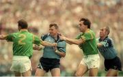 30 July 1995; Charlie Redmond, left, and Paul Clarke of Dublin in action against Brendan Reilly, right, and Robbie O'Malley of Meath during the Bank of Ireland Leinster Senior Football Championship Final match between Dublin and Meath at Croke Park in Dublin. Photo by Ray McManus/Sportsfile