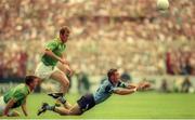 30 July 1995; Paul Curran of Dublin in action against Evan Kelly, left, and John McDermott of Meath during the Bank of Ireland Leinster Senior Football Championship Final match between Dublin and Meath at Croke Park in Dublin. Photo by Ray McManus/Sportsfile