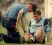 30 July 1995; Mick Galvin of Dublin receives medical attention during the Bank of Ireland Leinster Senior Football Championship Final match between Dublin and Meath at Croke Park in Dublin. Photo by Ray McManus/Sportsfile