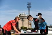 8 June 2020; James Talbot, left, signs in infront of Aaron Fitzsimons, Equipment Manager, centre, and Cathal Murtagh, Sports Scientist,  ahead of a Bohemian FC training session at Dalymount Park in Dublin. Following approval from the Football Association of Ireland and the Irish Government, the four European qualified SSE Airtricity League teams resumed collective training. On March 12, the FAI announced the cessation of all football under their jurisdiction upon directives from the Irish Government, the Department of Health and UEFA, due to the outbreak of the Coronavirus (COVID-19) pandemic. Photo by Sam Barnes/Sportsfile
