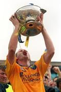 1 July 2001; Roscommon captain Fergal O'Donnell lifts the Nestor cup after the Bank of Ireland Connacht Senior Football Championship Final match between Roscommon and Mayo at Dr. Hyde Park in Roscommon. Photo by David Maher/Sportsfile