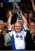 30 June 2002; Waterford captain Fergal Hartley lifts the cup after victory over Tipperary. Waterford v Tipperary, Guinness Munster Hurling Final, Pairc Ui Chaoimh, Cork. Photo by Ray McManus/Sportsfile