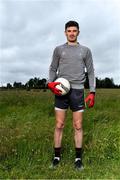 10 June 2020; David Hyland poses for a portrait before a training session with his Athy and Kildare team-mates Kevin Feely and Niall Kelly at a community pitch in Athy, Kildare. Following restrictions imposed by the Irish Government and the Health Service Executive in an effort to contain the spread of the Coronavirus (COVID-19) pandemic, all GAA facilities closed on March 25. Pitches are due to fully open to club members for training on June 29, and club matches provisionally due to start on July 31 with intercounty matches due to to take place no sooner that October 17. Photo by Piaras Ó Mídheach/Sportsfile