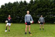 10 June 2020; Athy and Kildare team-mates, from left, Niall Kelly, Kevin Feely and David Hyland photographed before a training session at a community pitch in Athy, Kildare. Following restrictions imposed by the Irish Government and the Health Service Executive in an effort to contain the spread of the Coronavirus (COVID-19) pandemic, all GAA facilities closed on March 25. Pitches are due to fully open to club members for training on June 29, and club matches provisionally due to start on July 31 with intercounty matches due to to take place no sooner that October 17. Photo by Piaras Ó Mídheach/Sportsfile