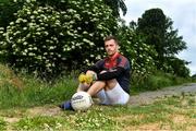 10 June 2020; Niall Kelly poses for a portrait before a training session with his Athy and Kildare team-mates Kevin Feely and David Hyland at a community pitch in Athy, Kildare. Following restrictions imposed by the Irish Government and the Health Service Executive in an effort to contain the spread of the Coronavirus (COVID-19) pandemic, all GAA facilities closed on March 25. Pitches are due to fully open to club members for training on June 29, and club matches provisionally due to start on July 31 with intercounty matches due to to take place no sooner that October 17. Photo by Piaras Ó Mídheach/Sportsfile