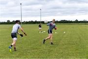 10 June 2020; Kevin Feely during a training session with his Athy and Kildare team-mates David Hyland, left, and Niall Kelly at a community pitch in Athy, Kildare. Following restrictions imposed by the Irish Government and the Health Service Executive in an effort to contain the spread of the Coronavirus (COVID-19) pandemic, all GAA facilities closed on March 25. Pitches are due to fully open to club members for training on June 29, and club matches provisionally due to start on July 31 with intercounty matches due to to take place no sooner that October 17. Photo by Piaras Ó Mídheach/Sportsfile