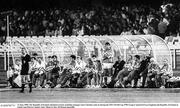 11 June 1990; The Republic of Ireland substitutes bench, including manager Jack Charlton, look on during the FIFA World Cup 1990 Group F match between England and Republic of Ireland at Stadio Sant'Elia in Cagliari, Italy. Photo by Ray McManus/Sportsfile