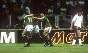 11 June 1990; Kevin Sheedy of Republic of Ireland, 11, celebrates after scoring his side's goal with team-mates Steve Staunton and Andy Townsend during the FIFA World Cup 1990 Group F match between England and Republic of Ireland at Stadio Sant'Elia in Cagliari, Italy. Photo by Ray McManus/Sportsfile