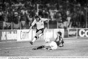 11 June 1990; Chris Waddle of England is tackled by Steve Staunton of Republic of Ireland during the FIFA World Cup 1990 Group F match between England and Republic of Ireland at Stadio Sant'Elia in Cagliari, Italy. Photo by Ray McManus/Sportsfile